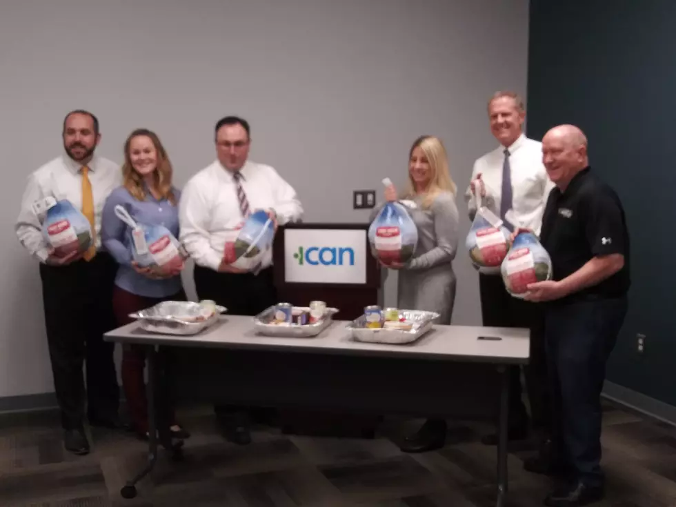 ICAN And First Source Credit Union Package Thanksgiving Dinners 
