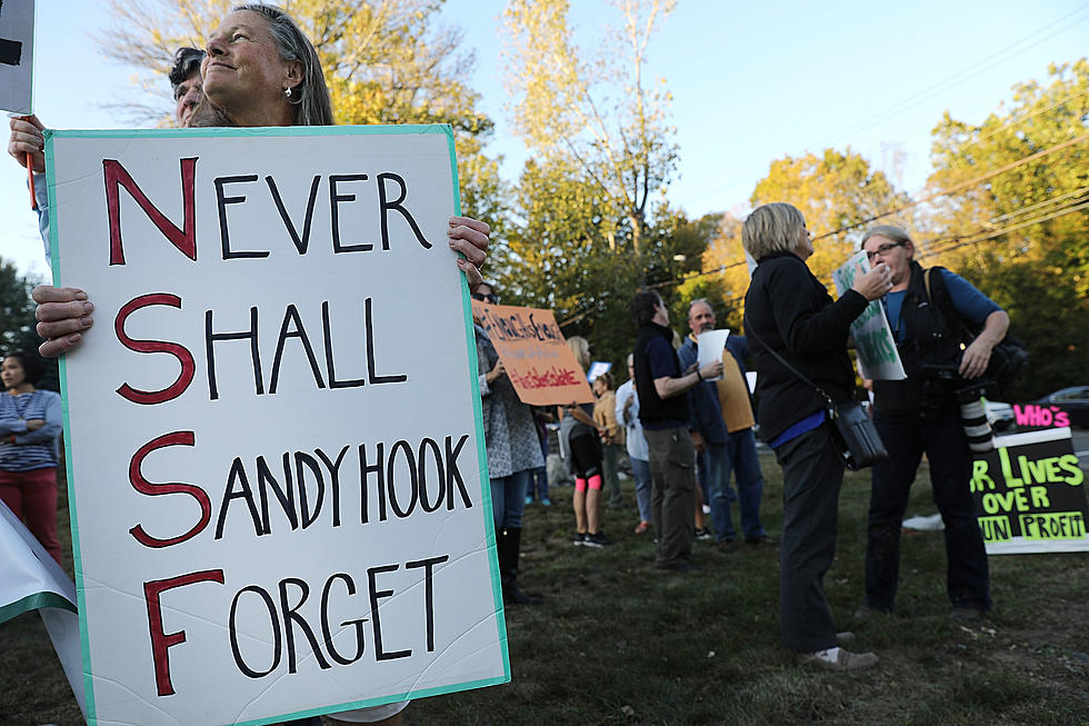 Sandy Hook Denier Charged with Having Victim's Dad's ID Info