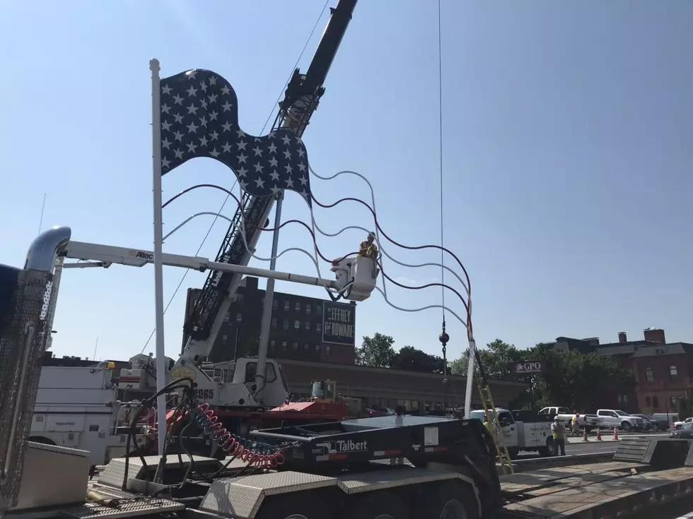 Refurbished American Flag Sculpture Unveiled On John Street