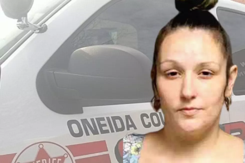 Police Allege She Drove Away with Her Car Door Open in Utica