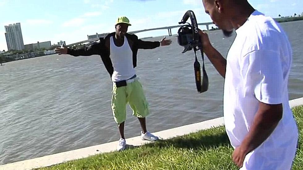 Free Beer & Hot Wings: Rapper Falls In Water During Photo Shoot [Video]