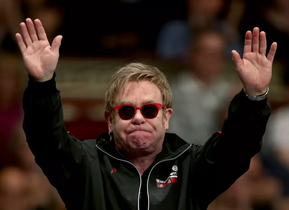 Free Beer & Hot Wings: Elton John Falls Out of His Chair at Celebrity Tennis Match [Video]