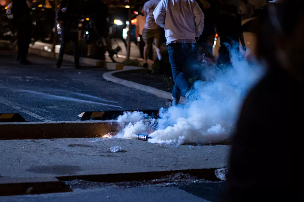 Officer Who Hit Protester With Flashbang Canister Gets Suspended