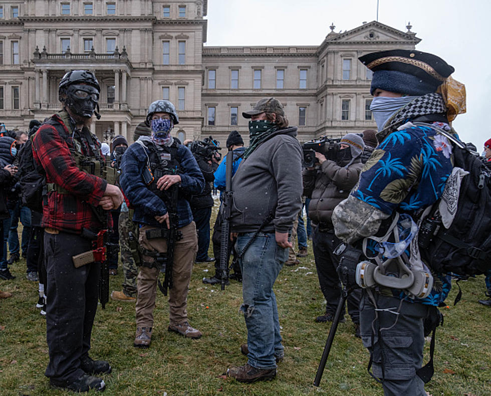 Guns & Protesters Return To Michigan’s Capitol