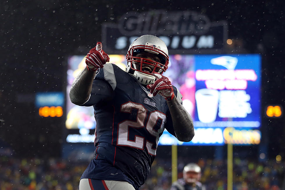 New England Inundates Indy, 45-7, in Soggy AFC Championship