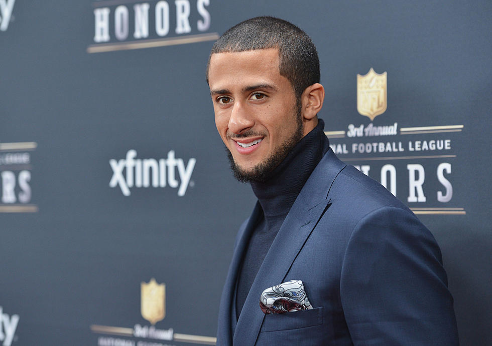 Kaepernick Hands Out Old Suits Outside Parole Office