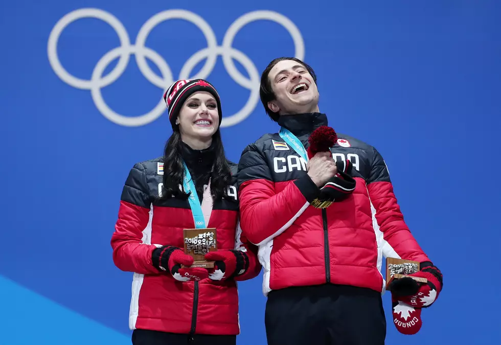 Highly-decorated Virtue, Moir Win Ice Dancing
