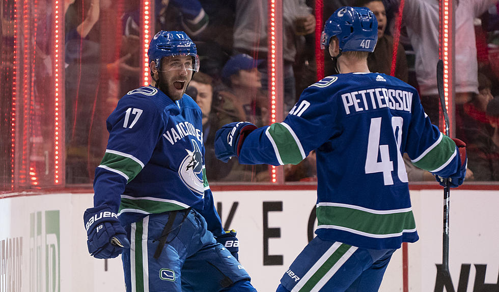 Edler Scores in OT, Canucks Rally to Beat Maple Leafs 3-2