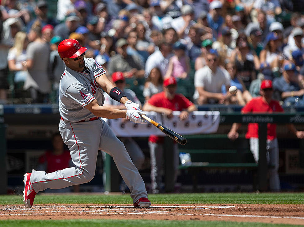 Pujols HR, Suarez Wins in Debut, Angels Rout Mariners 13-3