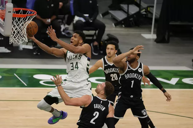 Bucks Rally in 4th to Beat Nets 124-118, Clinch Playoff Spot