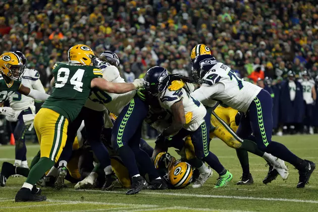 Status of Packers and Seahawks QBs Still Center of Attention