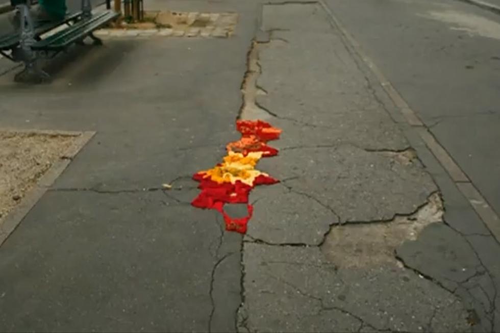 Artist Covers Potholes in Paris With Knitwork