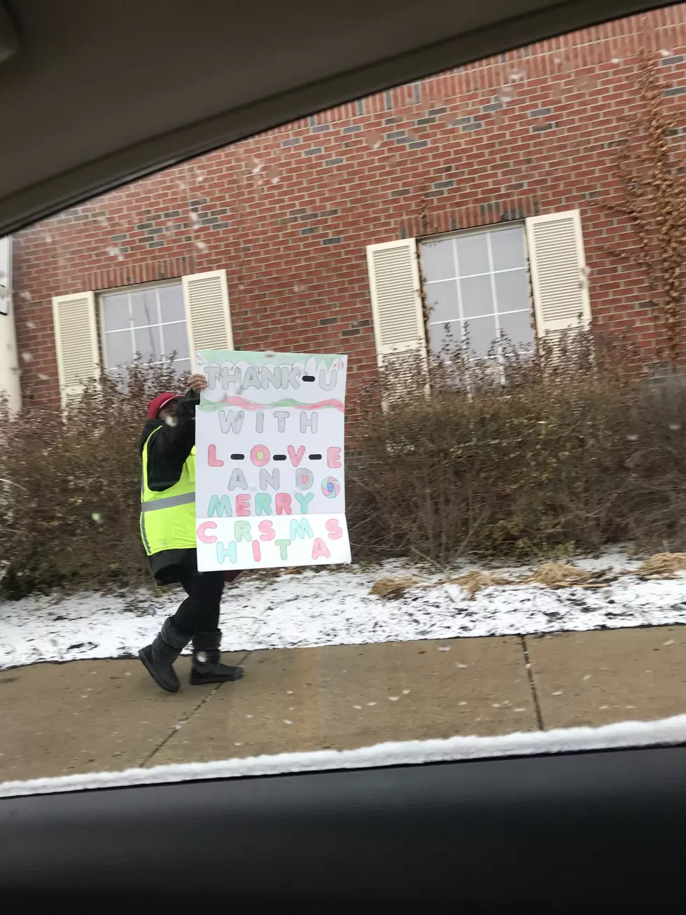 West Side GR Crossing Guard Shares Holiday Joy With Drivers