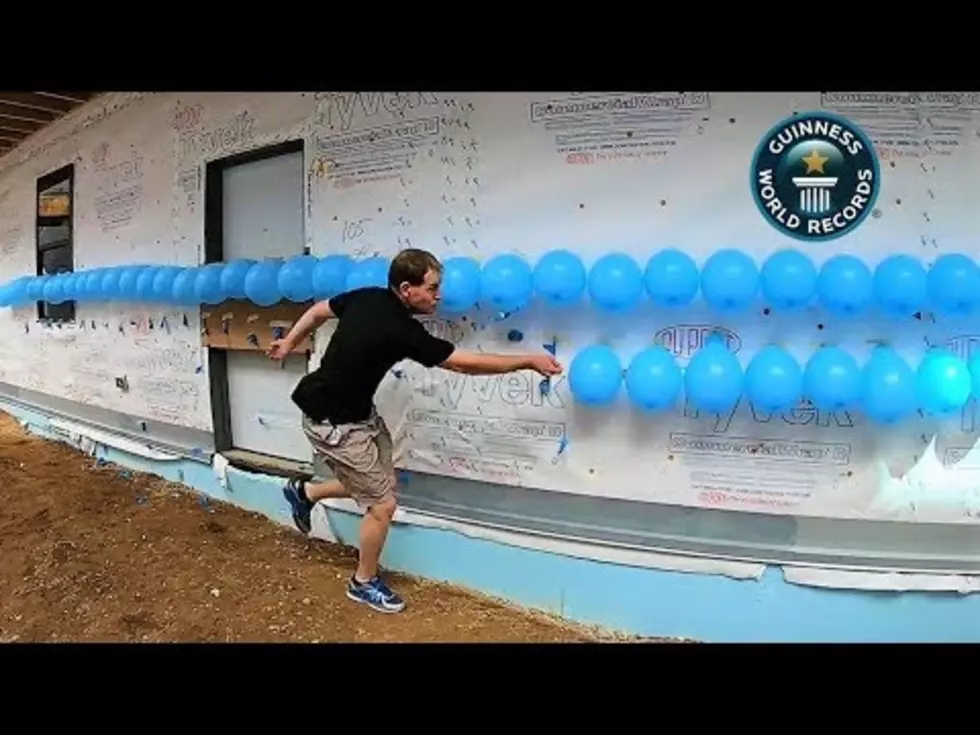 Man Sets Balloon Popping Record [Video]