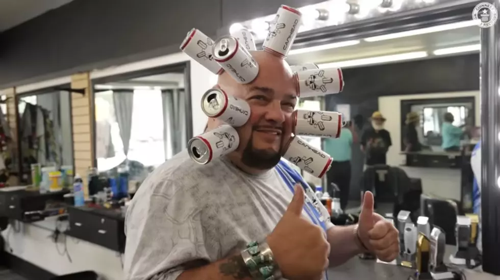 Video: Canhead Sets New Guinness World Record With 10 Cans Stuck To His Head
