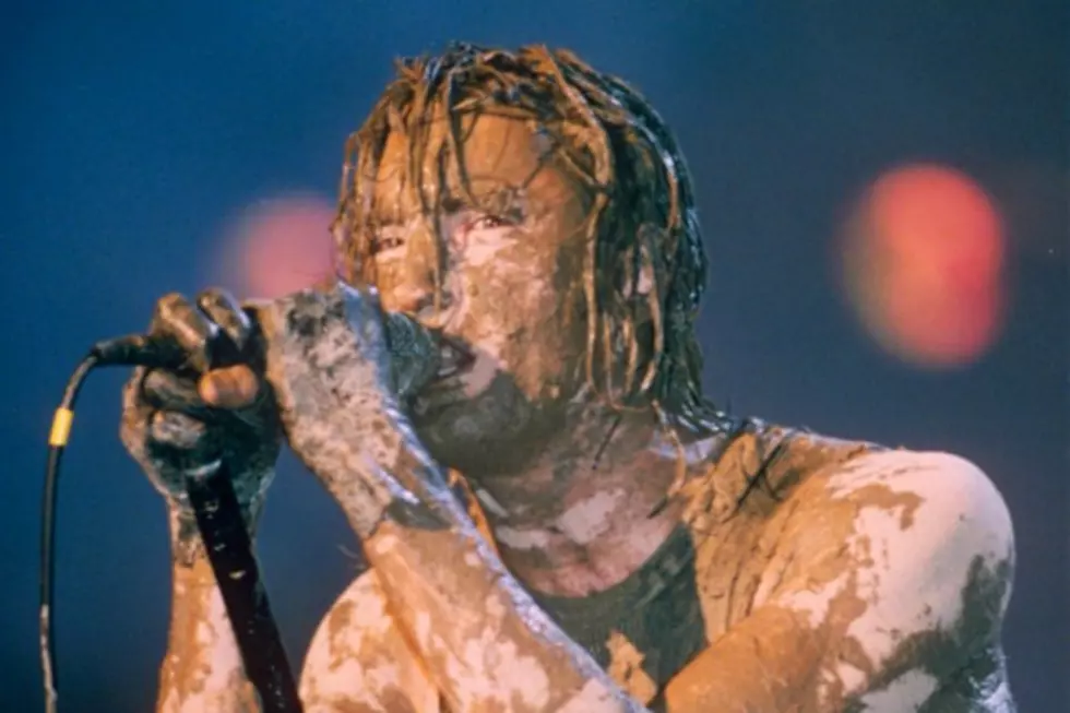 The Story of Nine Inch Nails&#8217; Historic, Mud-Filled Performance at Woodstock &#8217;94