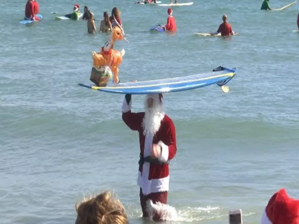 Surf’s Up at Cocoa Beach For Annual Surfing Santas Event