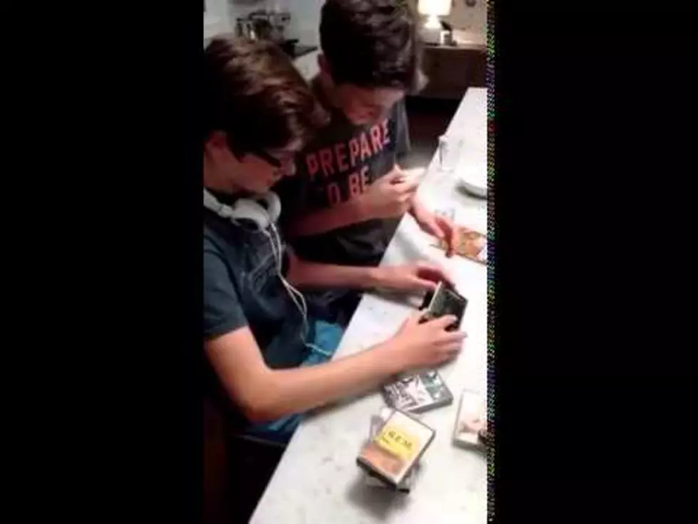 Two Kids Try to Figure out the Mystery of a Walkman