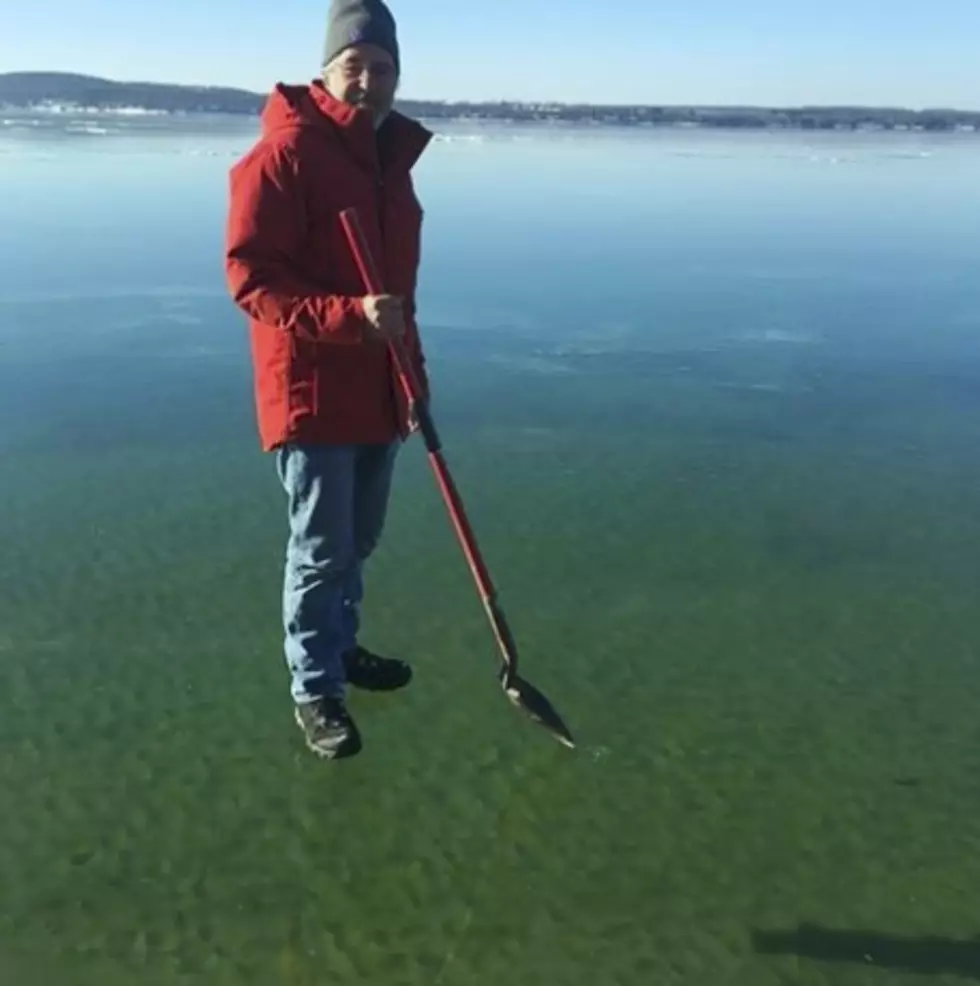 Rare ‘Clear Ice’ Phenomenon Makes It Appear Michigan Man Is Walking On Water