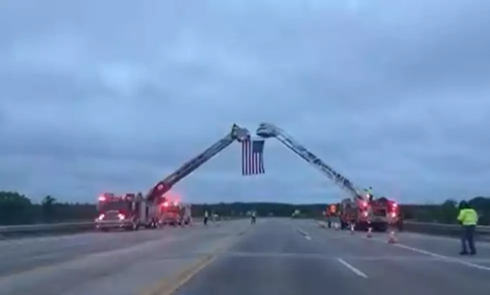 The Story Behind The Giant Flag Over US 131 This Morning