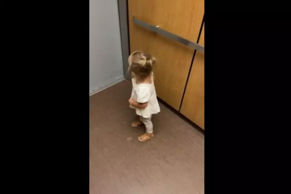 Watch 2-Year-Old Midwest Girl Ride Elevator for 1st Time