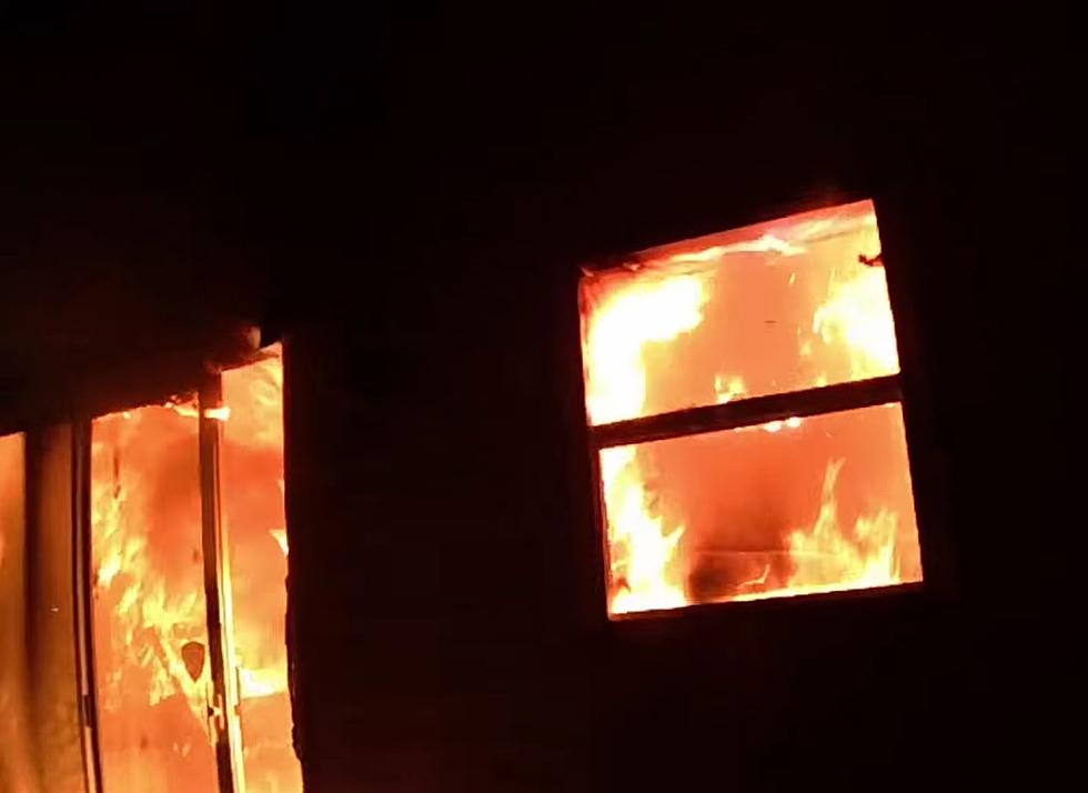 Watch Illinois Deputies Rescue a Family from a Burning House