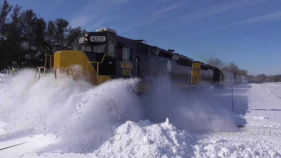 For Fun, Let&#8217;s Watch a Train Obliterate a Snow Drift in Illinois