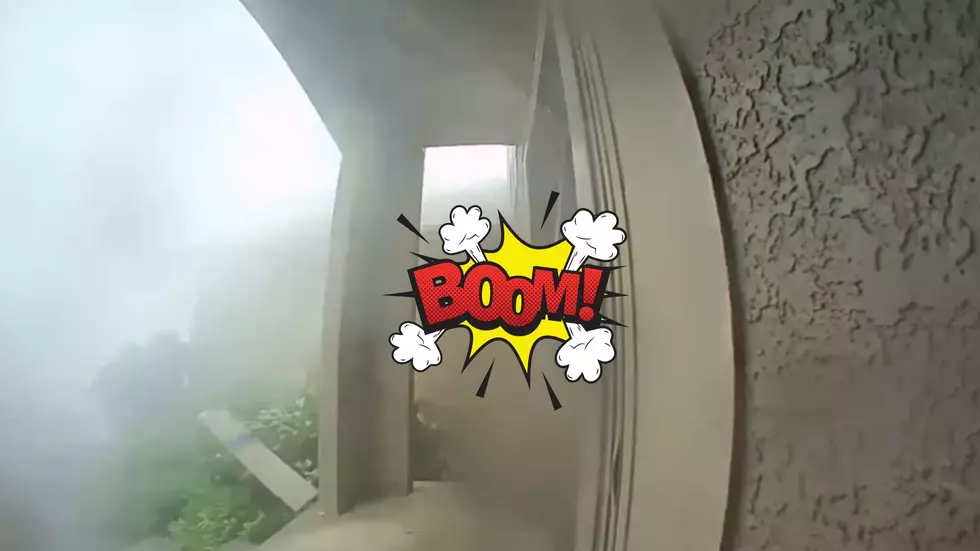 Watch a Sudden Microburst Make a Door in Kansas City Explode