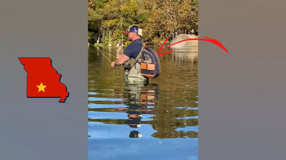 Missouri Dude at Bennett Springs Fishing with Dog in His Backpack