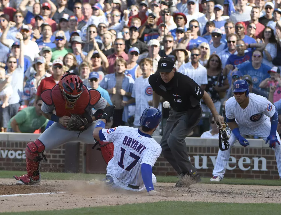 Bryant gallops home, Cubs rally in 8th, edge Cardinals 3-2