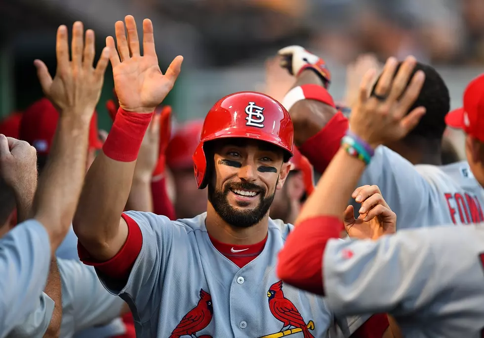 Carpenter homers, Cardinals outlast Pirates 11-10