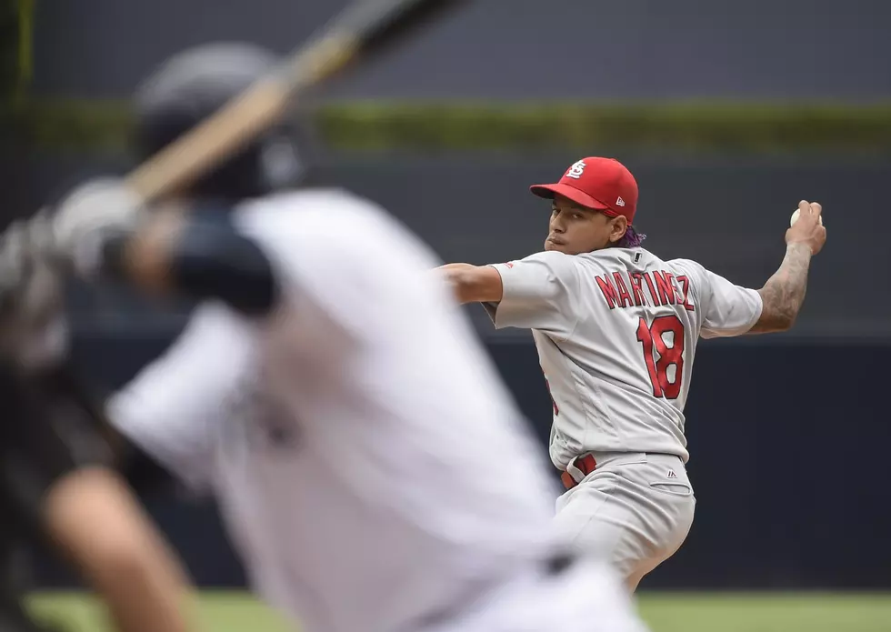 Martinez throws 3-hitter, Cardinals beat Padres 2-0