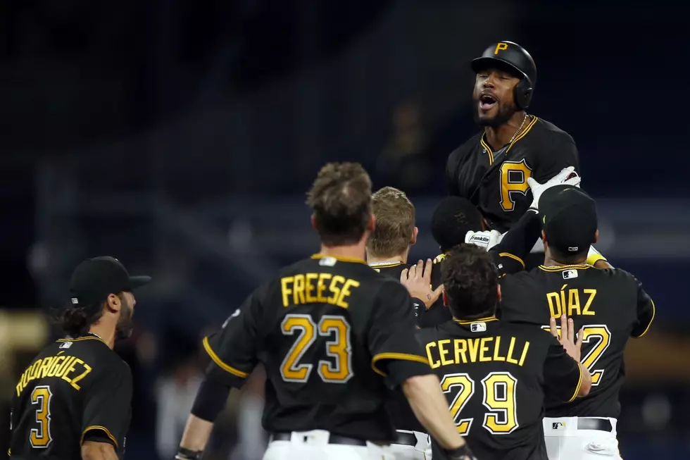 Marte's 11th-inning single rallies Pirates over Cardinals
