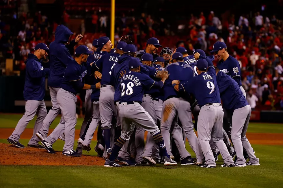 Brewers clinch playoff spot, sweep Cards 2-1; Cubs also in