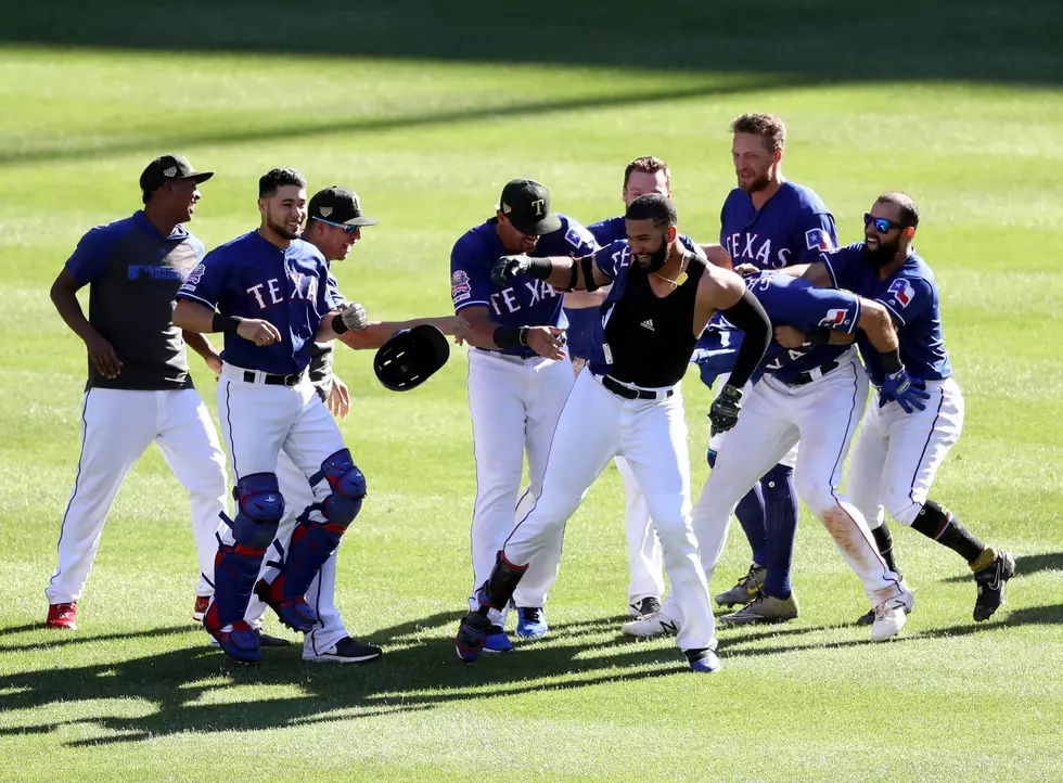 Rangers score 2 runs in 10th, rally past Cardinals 5-4