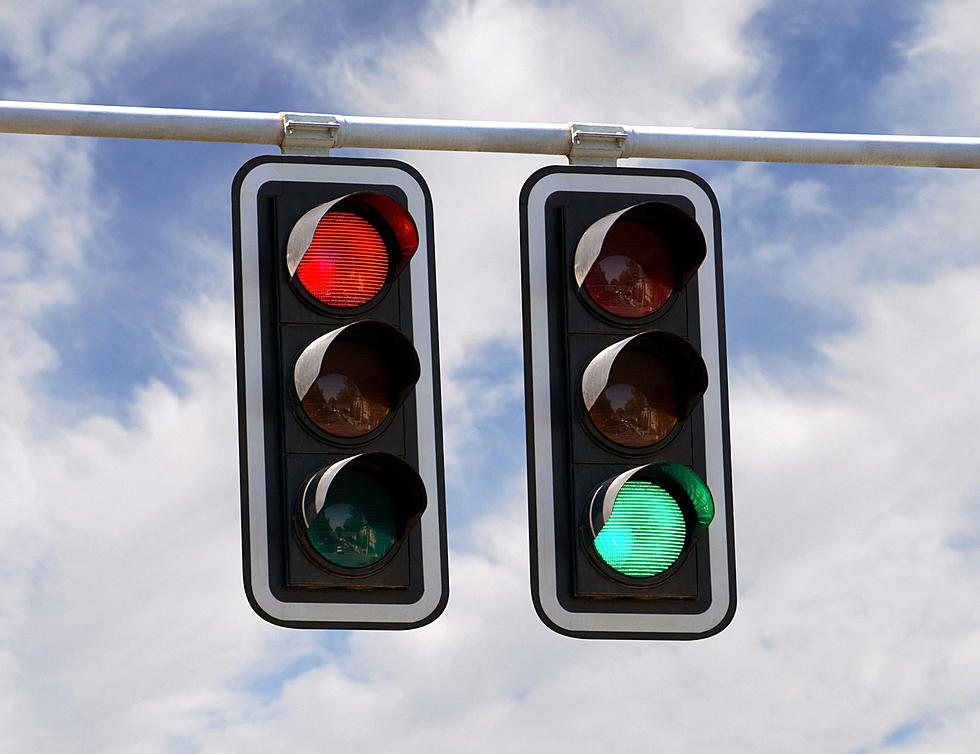 Clinton Police Detail Traffic Light Signal Changes Along 2nd Street