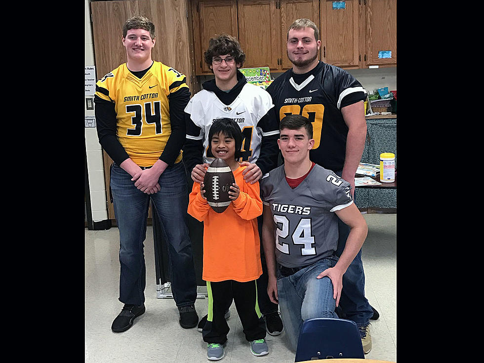 Smith-Cotton Football Players Make Student’s Wish Come True