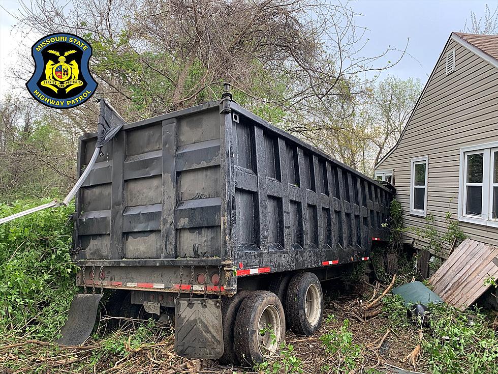 Dump Truck Crashes Into House On I-35
