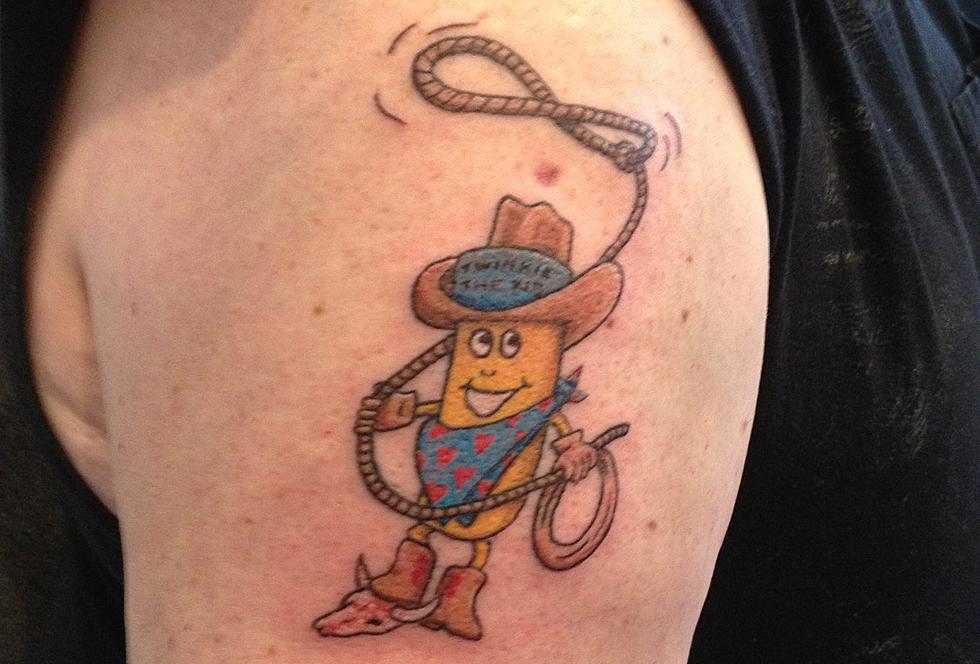 Brian Loses Bet – Gets Twinkie Tattoo Live on the Air [VIDEO/PICTURES]