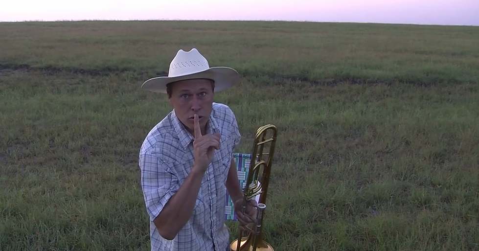 Why Does This Man Have a Trombone in the Middle of a Field? [VIDEO]