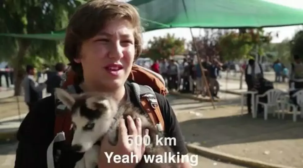 Syrian Teen Flees Country on Foot with Puppy in Tow