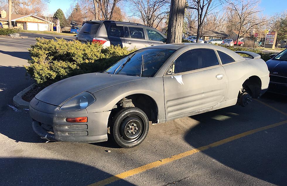 Car Abandoned and Left on Blocks in Fort Collins King Soopers Lot