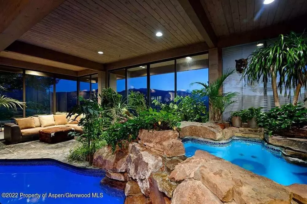 Retro Aspen Colorado Home has a Hot Tub + Pool in the Living Room