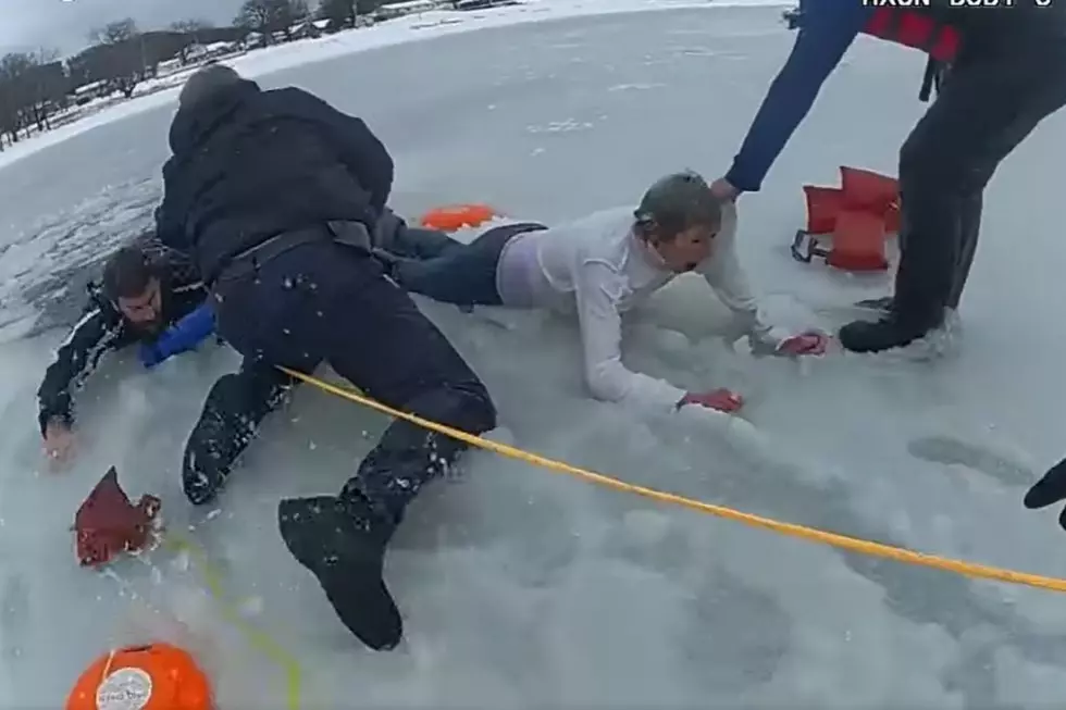 WATCH: Wisconsin Police Rescue Woman and Dog Who Fell Through Ice
