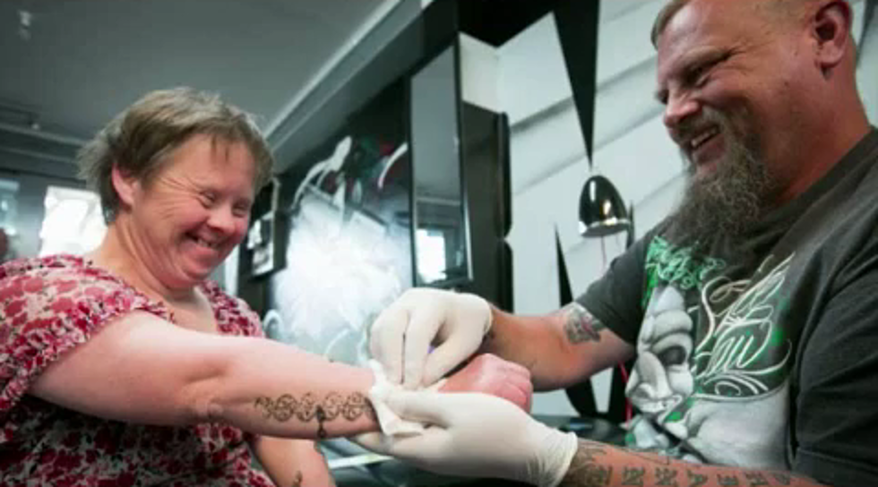 New Zealand Tattoo Artist Applies Stick on Designs to Down Syndrome Woman Every Week
