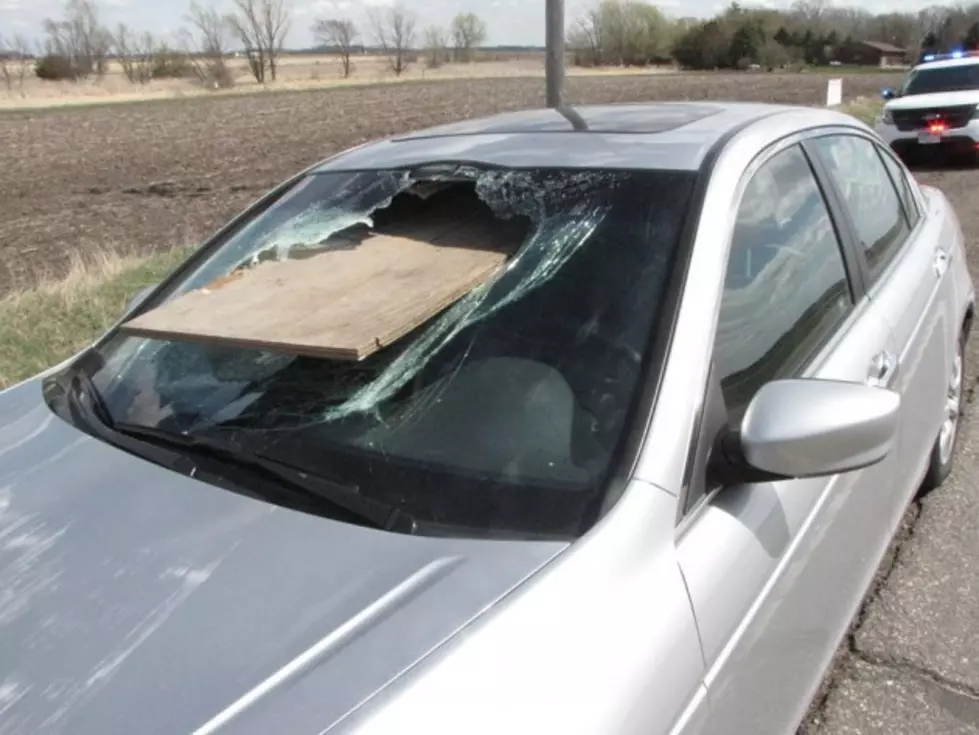 Close Call for Elderly Minnesota Couple When Plywood Pierces Windshield