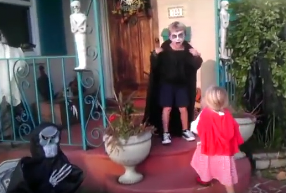 Little Girl Protects Big Brother from Scary Halloween Decoration [VIDEO]