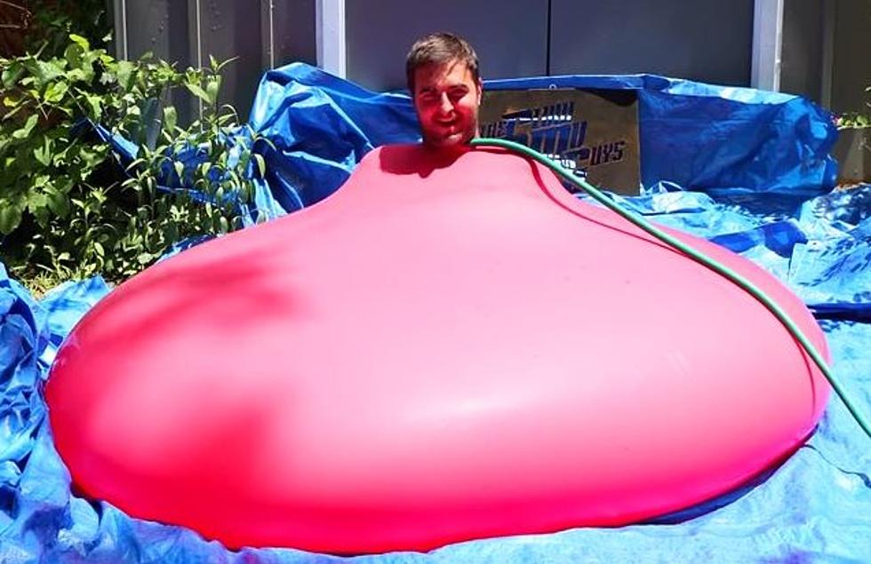 Watch Giant Water Balloon with Guy in It Explode in Slo-Mo