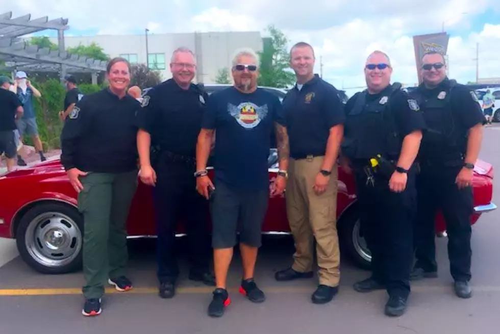 Guy Fieri Visits Sioux Falls and Poses With Police Officers