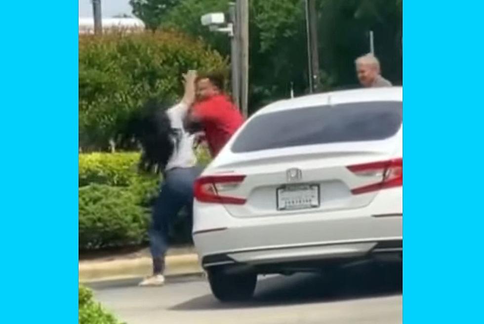 Man and Woman Brawl In Gas Line When She Tries To Cut In (NSFW)